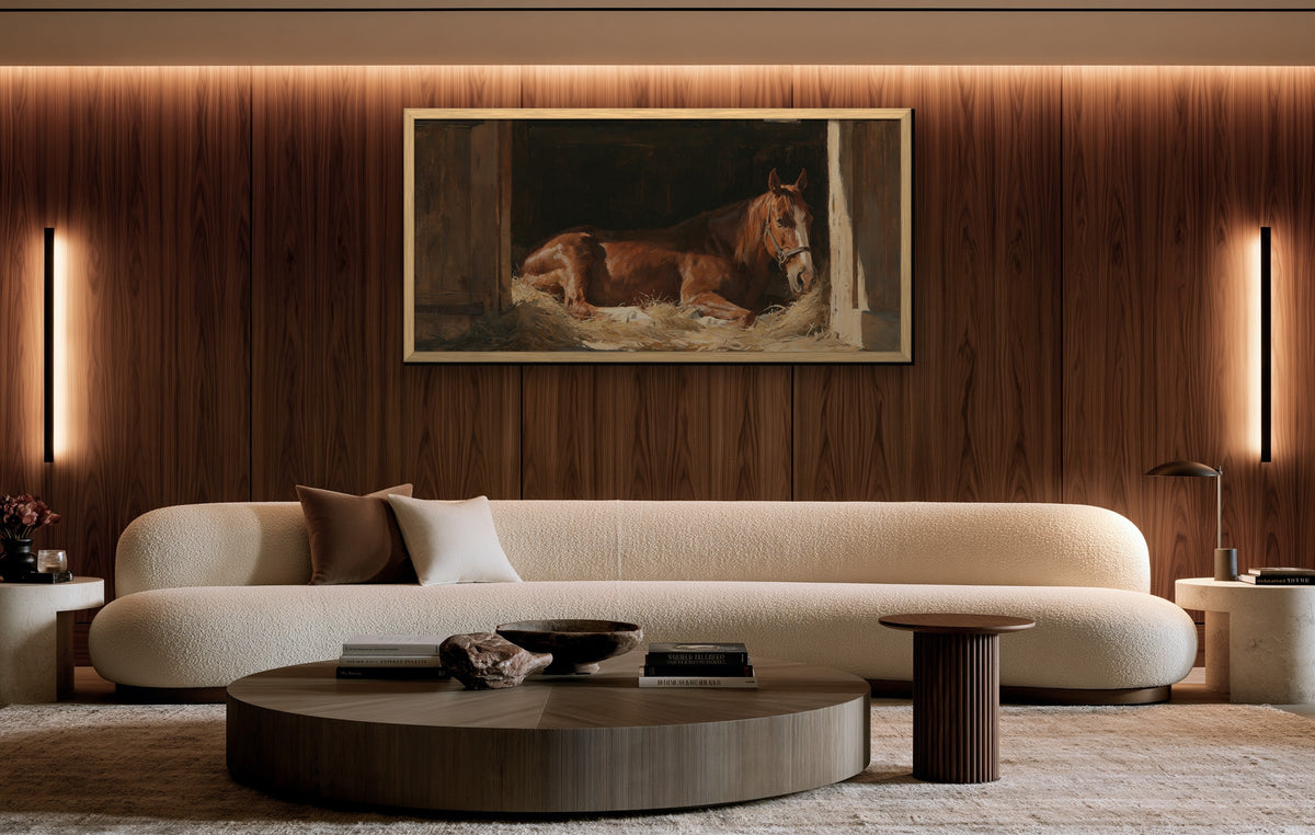 L'Écurie framed canvas in a walnut-paneled living room
